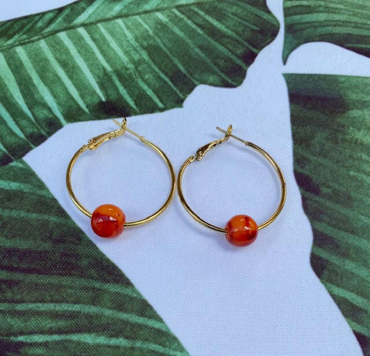 1 Orange Bead Gold Hoop.