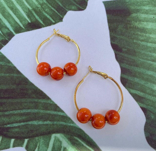 3-Orange Bead Gold Hoops.